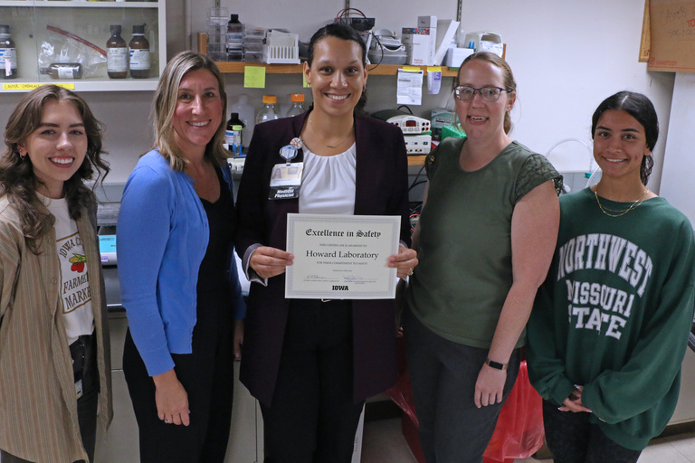 Michelle Howard and lab with safety award