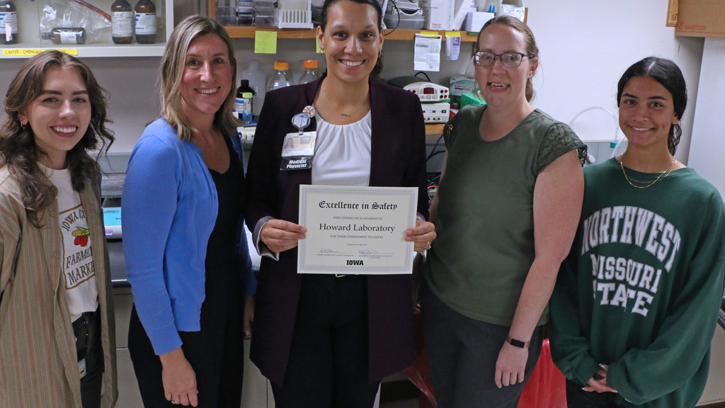 Michelle Howard and lab with safety award